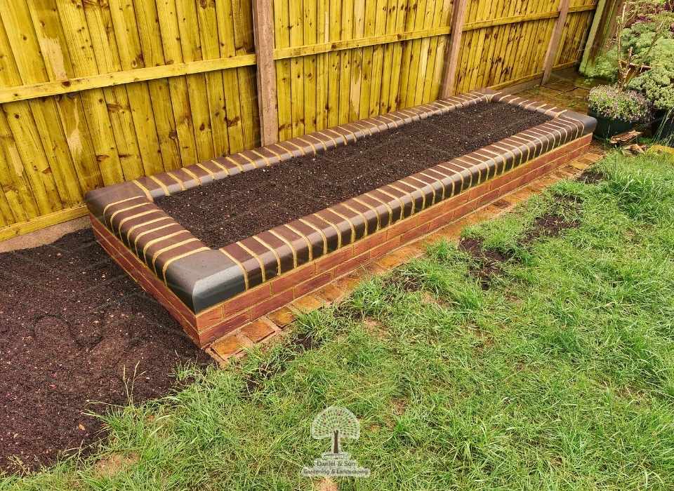 Raised Flower Bed: using bullnose bricks
